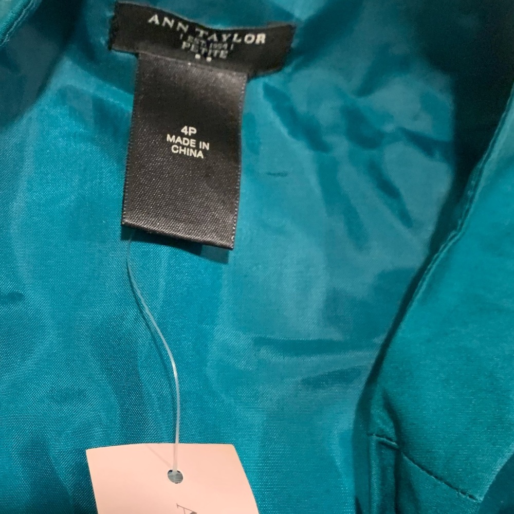 Teal dress with a black waistband